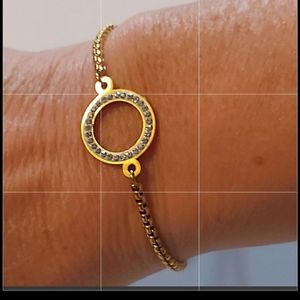 Handmade stainless steel gold color bracelet crystals in circle center piece.